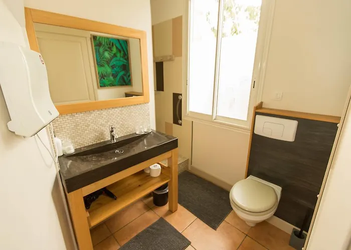 La Maison Cachee Gæstehus *